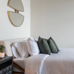 a bedroom with a bed