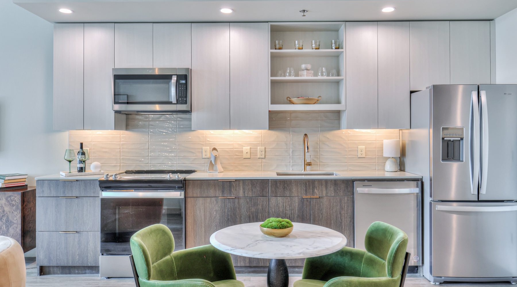 a kitchen with a table and chairs