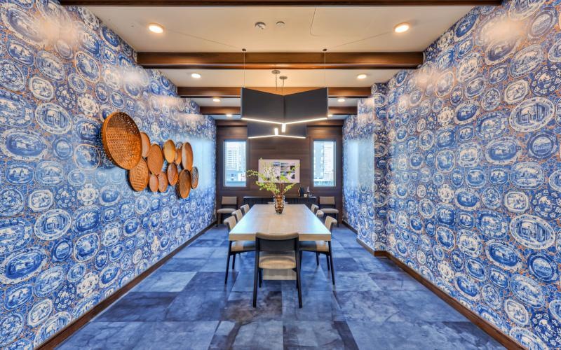 a room with a table and chairs