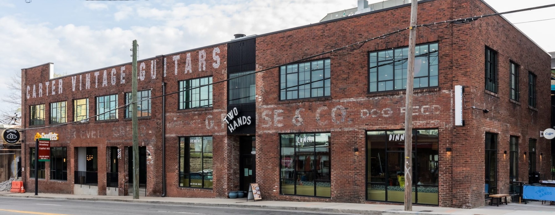 exterior of local community areas and a large brick building